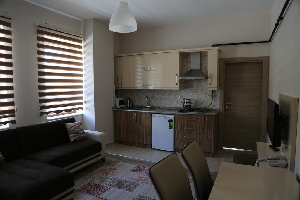 Ozsoy Apart Aparthotel Ürgüp Szoba fotó