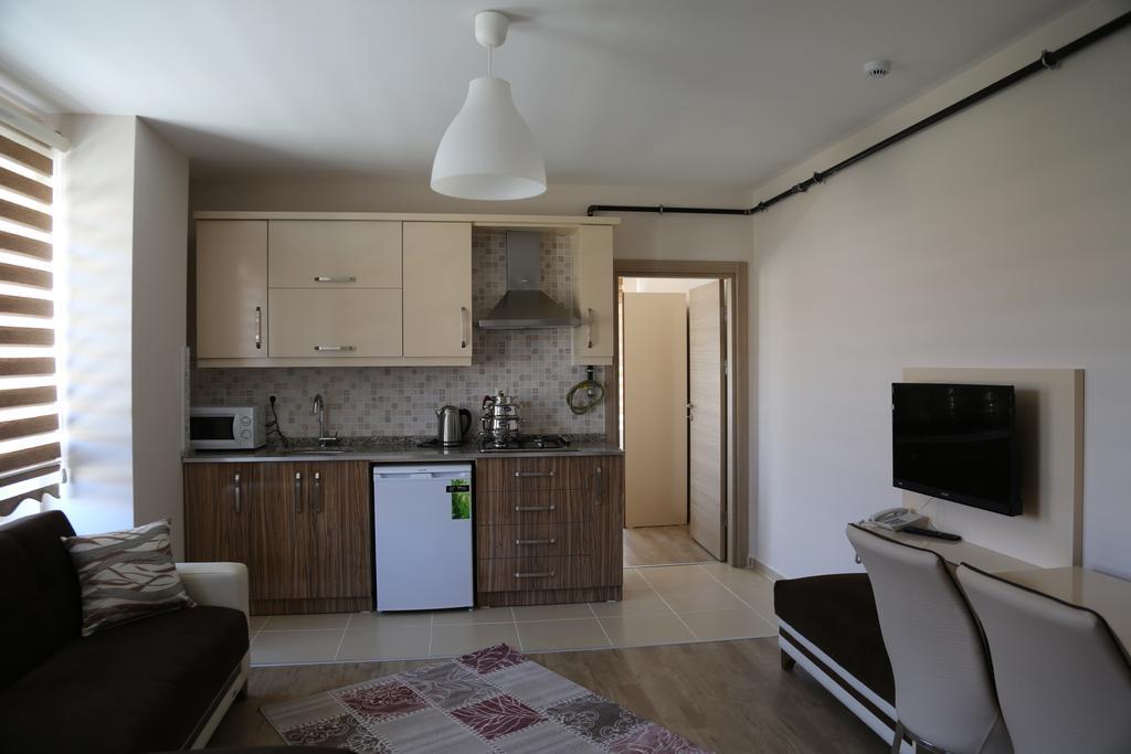 Ozsoy Apart Aparthotel Ürgüp Szoba fotó