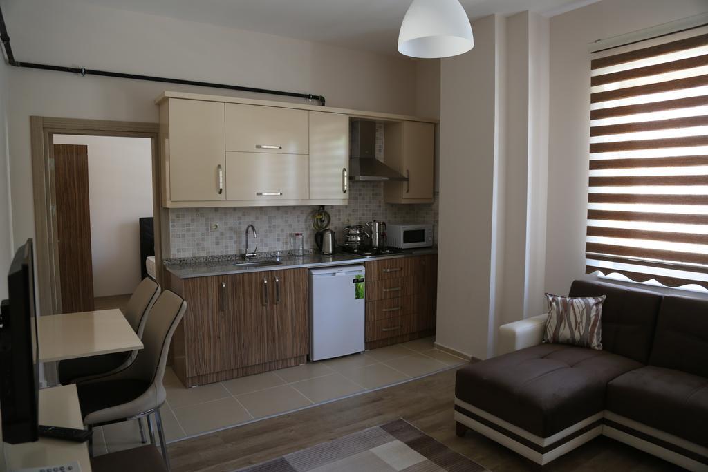 Ozsoy Apart Aparthotel Ürgüp Szoba fotó