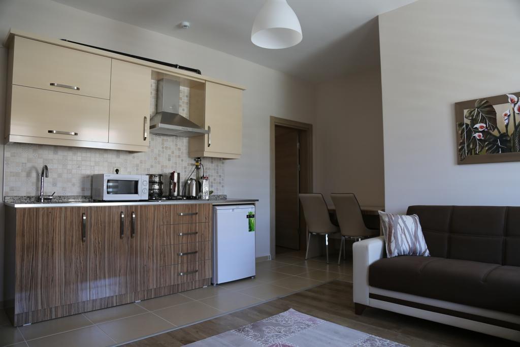 Ozsoy Apart Aparthotel Ürgüp Szoba fotó